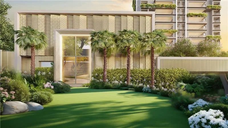 Fachada do condomínio com área verde e paisagismo planejado.
