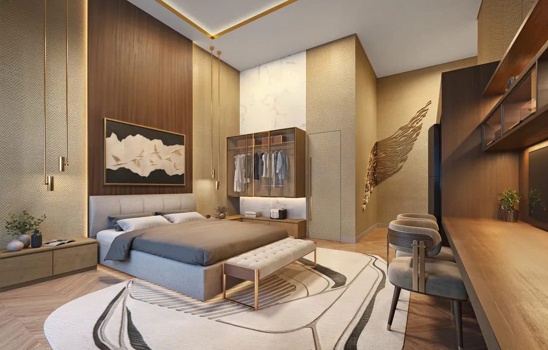 Quarto integrado decorado com cama de casal, painel de madeira, armários em vidro e escrivaninha