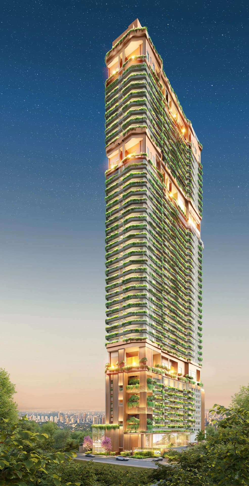 Fachada frontal completa de prédio alto com varandas verdes e iluminação.