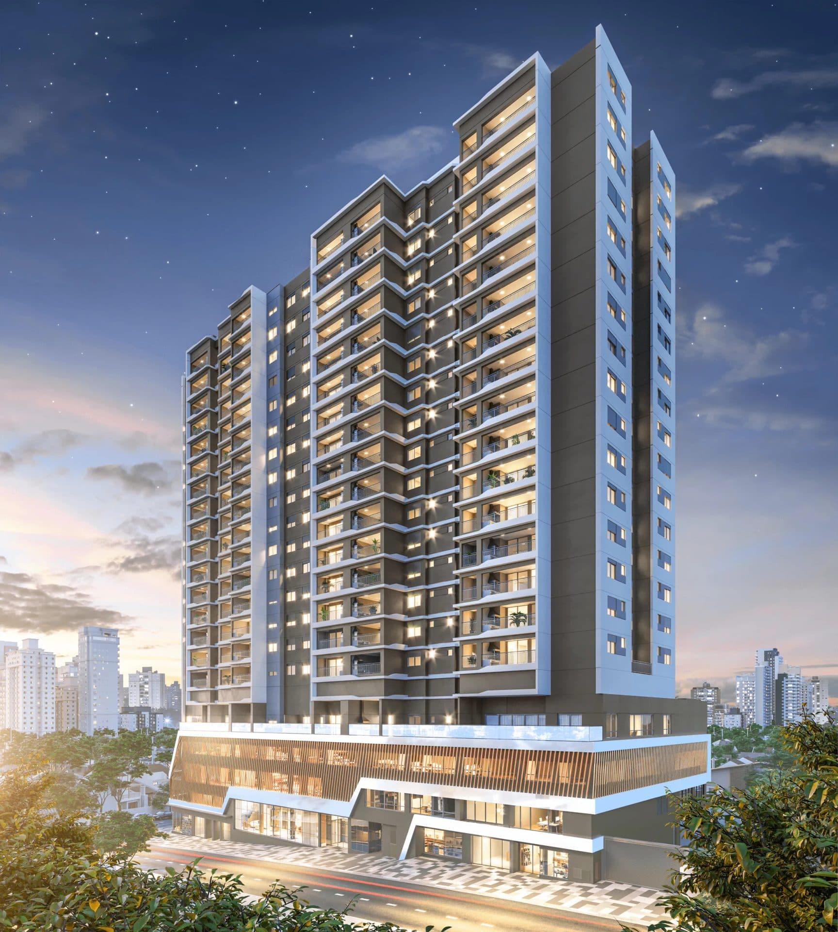 Fachada do edifício residencial sob céu estrelado à noite.