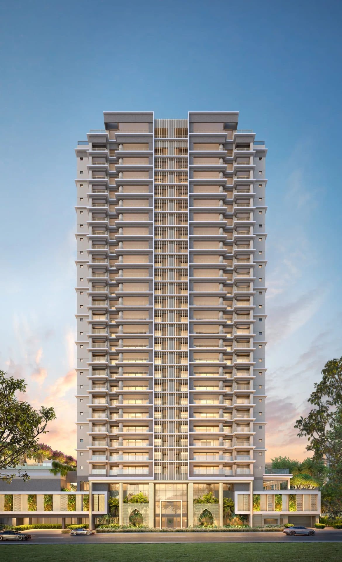 Vista frontal do edifício residencial com varandas e térreo arborizado