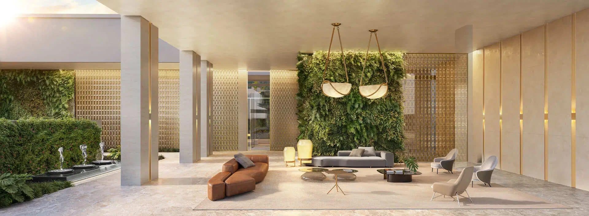 Hall de entrada amplo e decorado com sofas, poltronas, paredes revestidas e jardim vertical.