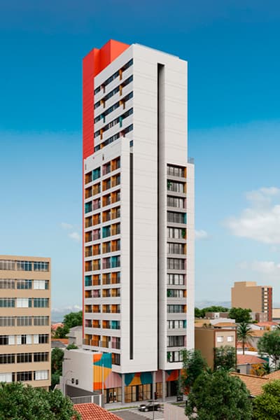 Fachada do edifício residencial de torre única com pintura em tons de branco e vermelho.